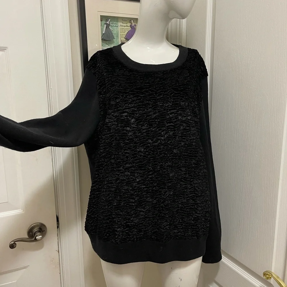 Kate spade black sweater. Looks like Front made with the unique sheep fur.